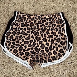 Leopard running short size large